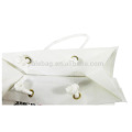 El embalaje impermeable de la playa del fieltro a granel blanco lleva el bolso con logotipos el bolso de compras